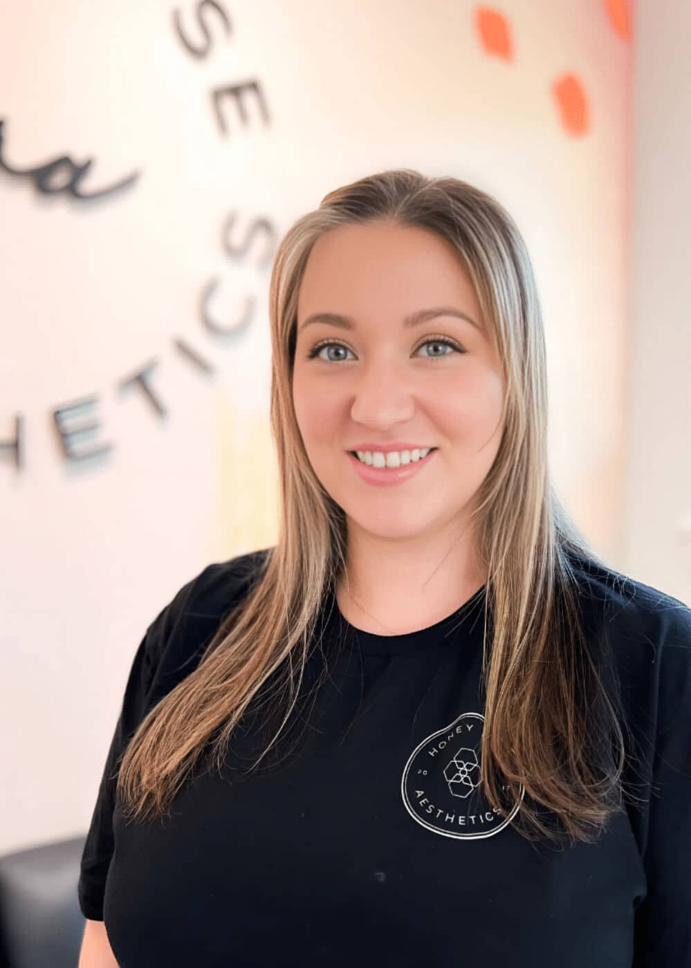 a woman smiling for the camera