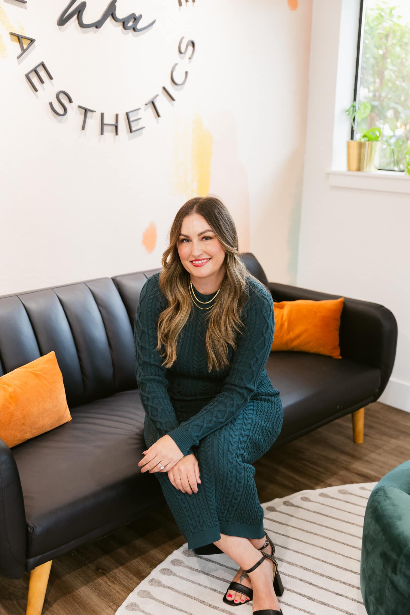 a woman sitting on a couch